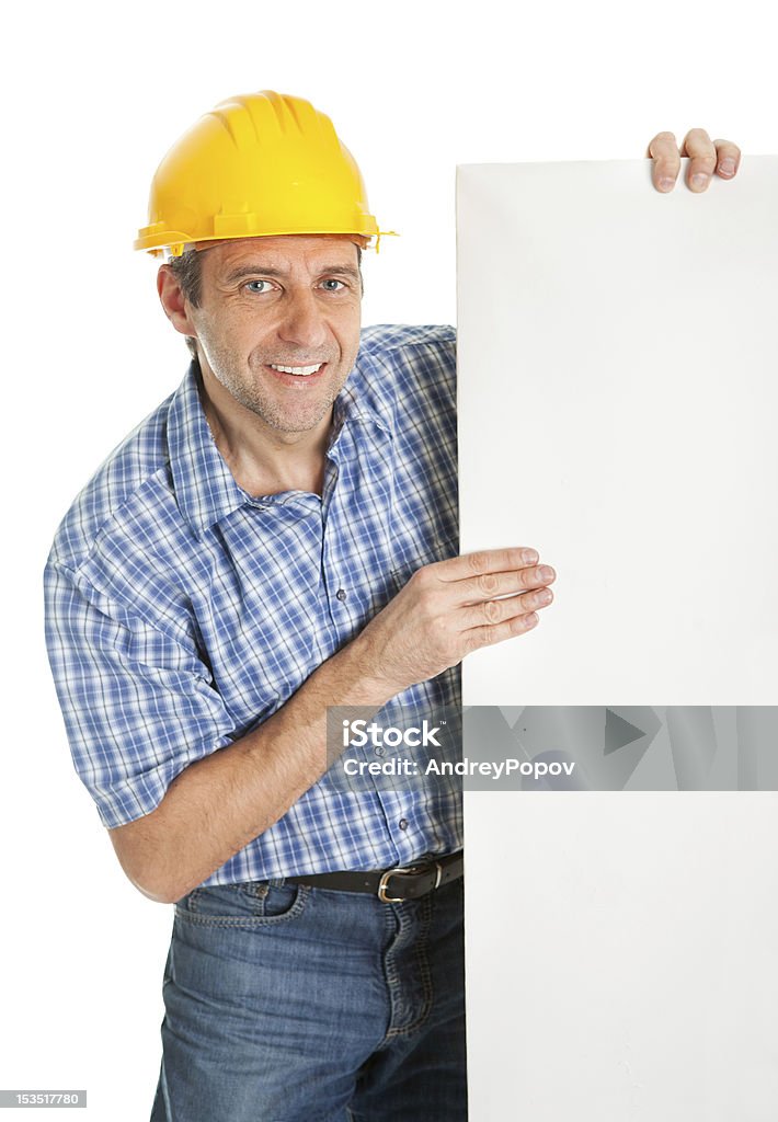 Confiante trabalhador apresentando vazio bordo - Foto de stock de Adulto royalty-free