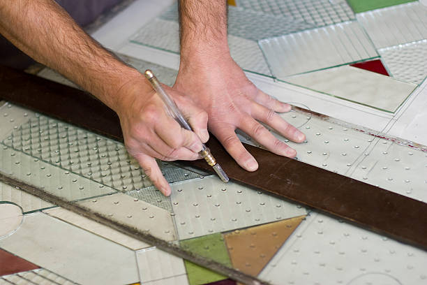 istock Craftsman Creating Victorian Stained Glass Panels 153518021