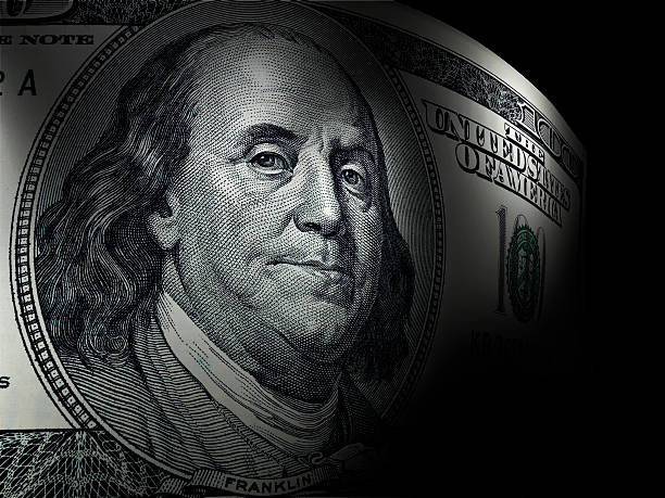Benjamin Franklin's close up in a hundred dollar bill stock photo