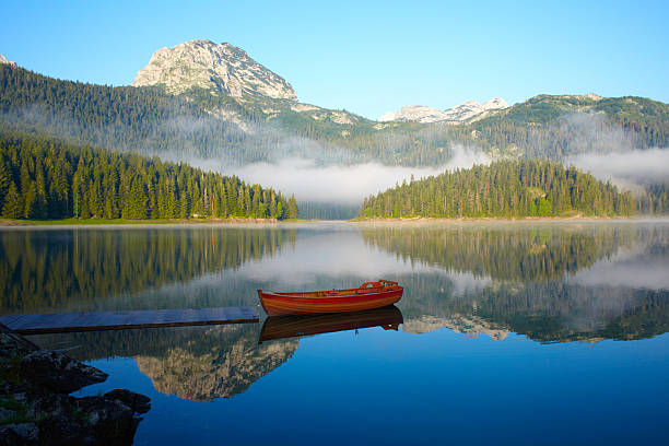 istock Landscape with mountains, lake and boat 153518126