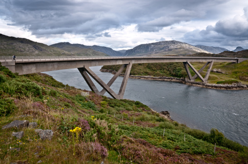 The bridge was opened, in 1984, by the Queen. It may only be 276m long, crossing a 130m stretch of water but, the curving five-span continuous pre-stressed concrete hollow bridge, set in the stunning scenery of Sutherland, has been described as one of the most beautiful bridges in the world. Built by Morrison Construction Group, it was designed by the architects Arup to complement the natural beauty of the site, and has won several design and construction awards.