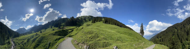 Panoramic view of the idyllic Rellstal valley (Montafon, Vorarlberg, Austria). In the background the famous Zimba peak, embedded in the Rätikon mountains, one of the most impressive regions of Austria and the European Alps. silbertal stock pictures, royalty-free photos & images