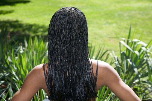 african american woman with cornrow hairstyle