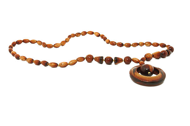 istock Beautiful wooden necklace, isolated on white 153519097