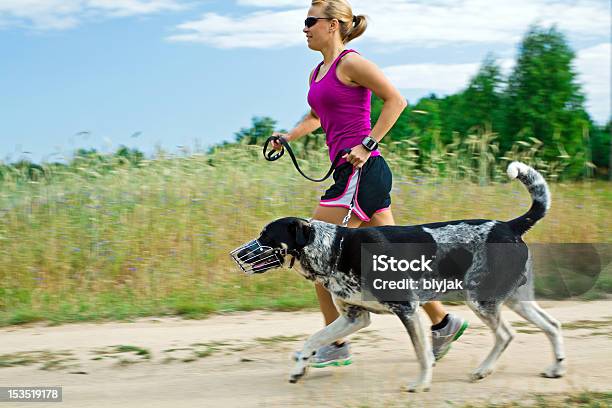 Walking And Running With A Dog Stock Photo - Download Image Now - Adult, Adults Only, Beautiful People