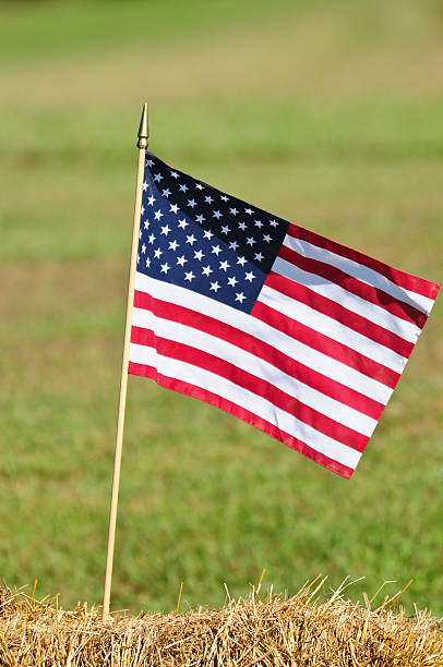 istock American Flag on Hay Bail 153519574