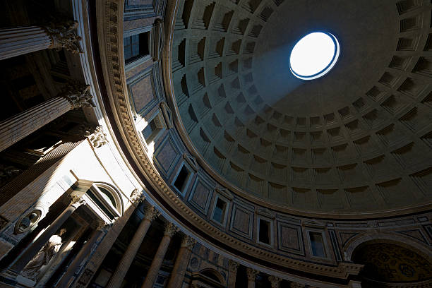 istock Sunbeam from hole in Pantheon dome lights up an angel 153519576