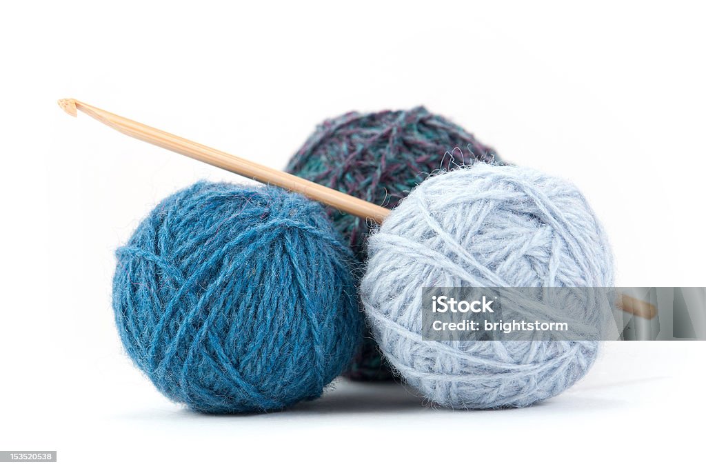 Crochet accessories A couple of yarn balls with crochet kneedle Bamboo - Material Stock Photo