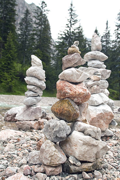 istock Stone Pyramides in river bed, to Mt. Zugspitze 153521141