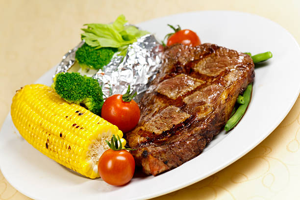 New York Strip Steak,grilled,with green Beans,Corn Cob.