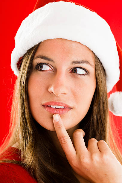 istock Beautiful and Thoughtful Santa Girl 153521923