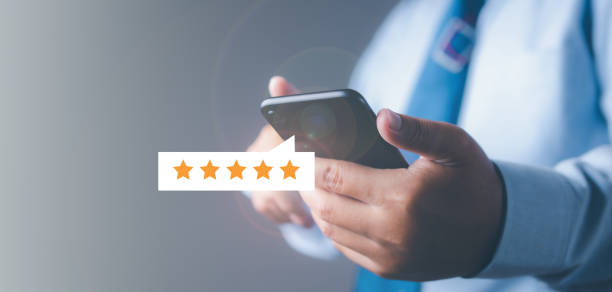 istock Businessman touching giving high score for feedback review satisfaction service. Customer satisfaction experience with five star icon and excellent for feedback review satisfaction service. 1535220932