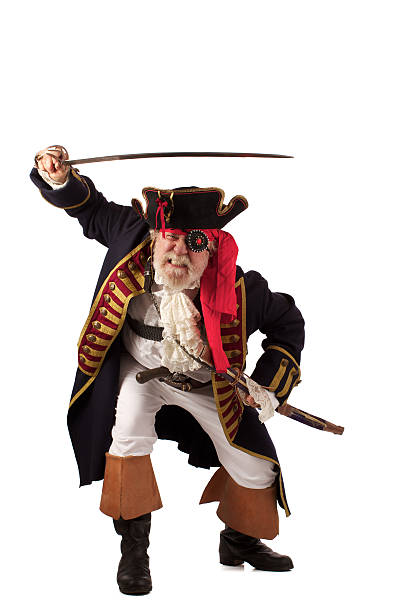 istock Traditional gray bearded pirate captain lunging forward with raised sword 153522296
