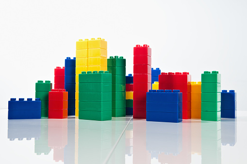 Plastic multi-colored bricks simulating city skyline