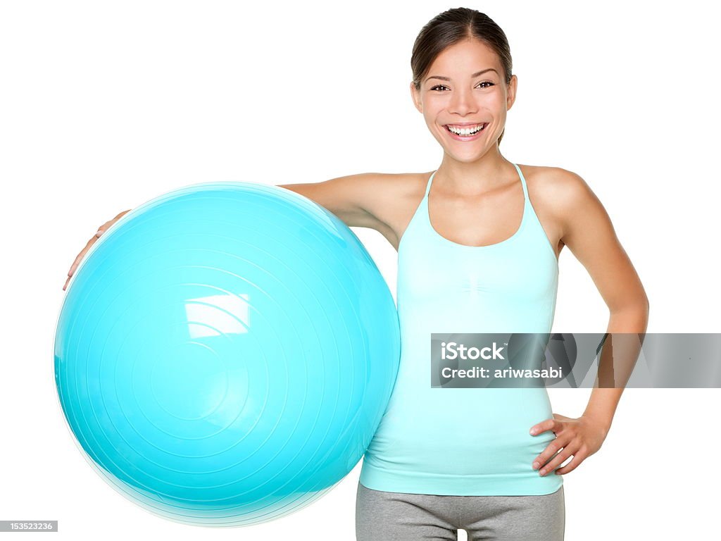 Fitness donna con palla pilates - Foto stock royalty-free di Abbigliamento sportivo