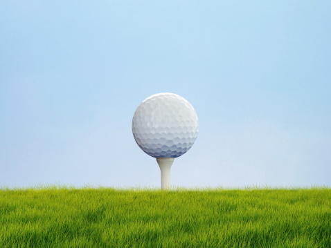 Close-up photo of playing golf in the professional club outdoors with sports equipment on the green grass with the ball.