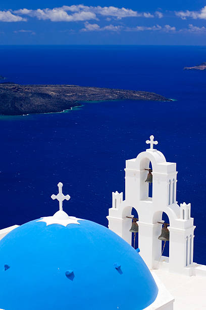 Blue dome churches at Santorini island,Greece stock photo