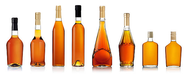 brandy bottles Set of brandy bottles isolated on white background cognac stock pictures, royalty-free photos & images
