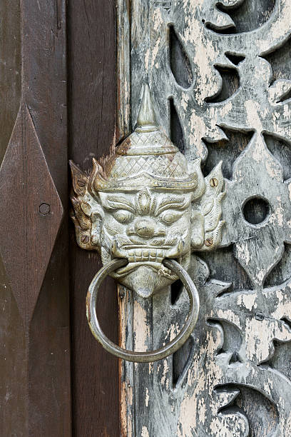 Metal giant face door knocker. stock photo