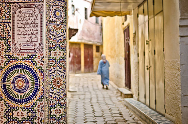 Street of Meknes with decorating tiles Tipical islamic decoration in a street of Mekens, Morocco. Shallow depth of field meknes stock pictures, royalty-free photos & images