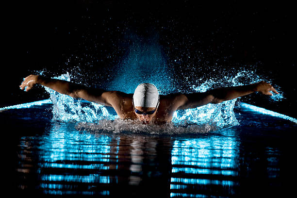 istock Man in water with arms spread wide 153525359