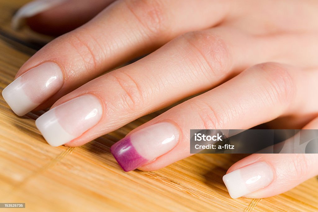 beautiful female fingernails beautiful female colored fingernails in pink and white Adult Stock Photo