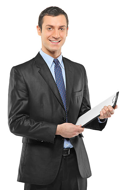 istock Smiling businessman holding a clipboard 153525795
