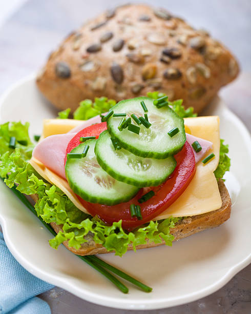 istock Pumpkin seed roll with vegetables,ham and cheese 153526485