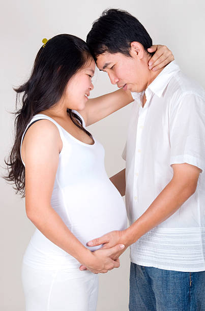 istock Pregnant woman with husband 153528406