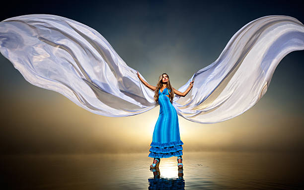 istock woman standing on water. XXL 153528412