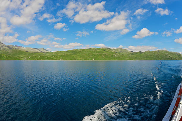 Panoramic view of Jotunheimen National Park from a boat on Lake Bygdin