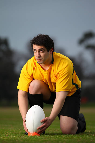 istock Rugby Player lines up the Ball for a Kick 153528943