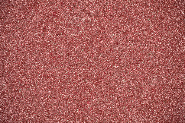 High resolution Sand Paper background High resolution sand paper background with vignette effect. sand paper stock pictures, royalty-free photos & images