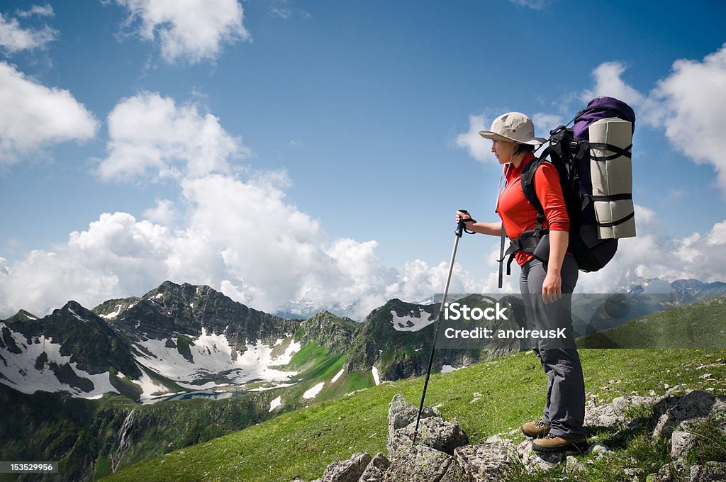 woman hiking woman hiking in the mountain Activity Stock Photo