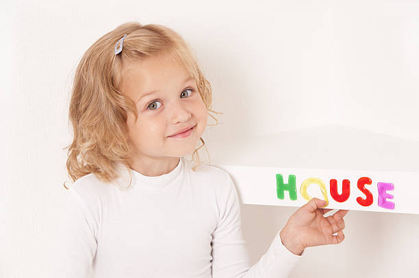 istock Blonde little girl dressed in white 153529986