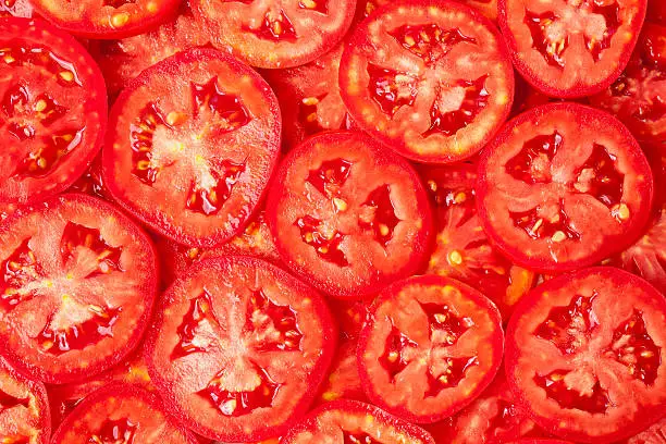 Healthy natural food, background. Tomatoes slices. More background of fruits and vegetables in my portfolio.