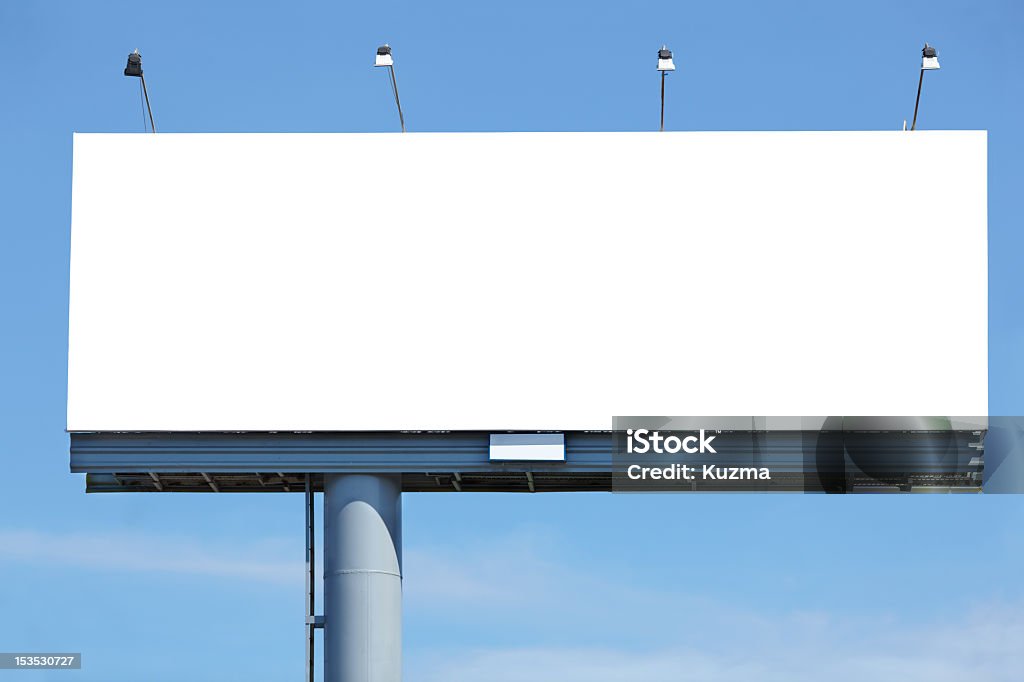 Large blank white billboard in the city Huge blank billboard against blue sky for your design Billboard Stock Photo