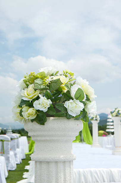 Flowers at an outdoor wedding venue stock photo