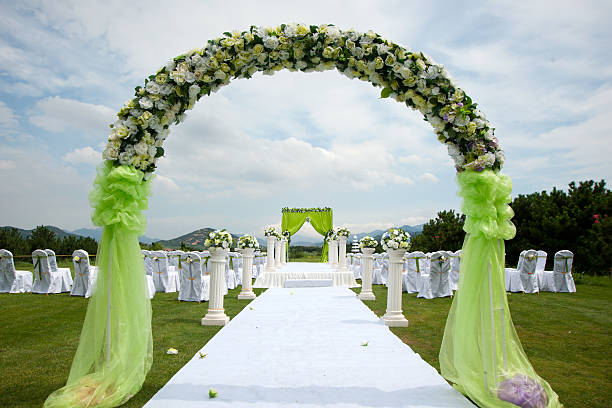 Flowers decorations at an outdoor wedding venue stock photo