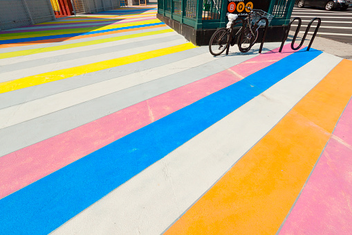 Multicolored painted sidewalk in Brooklyn, New York.