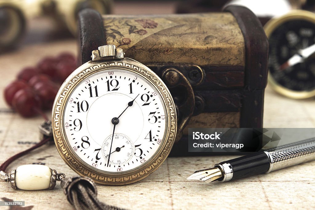 Old fashioned style Antique Pocket Clock and other old fashioned objects Auto Post Production Filter Stock Photo