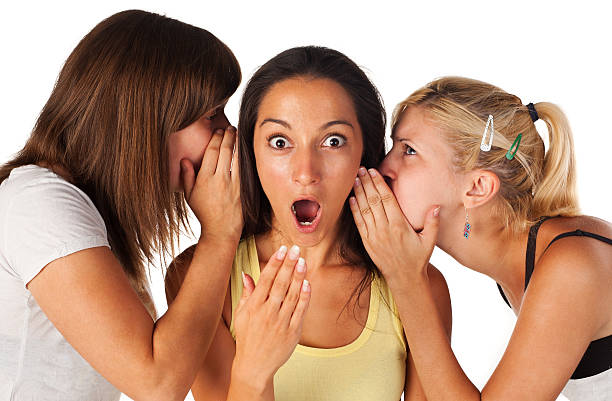 istock Friends whisper some interesting news 153532686