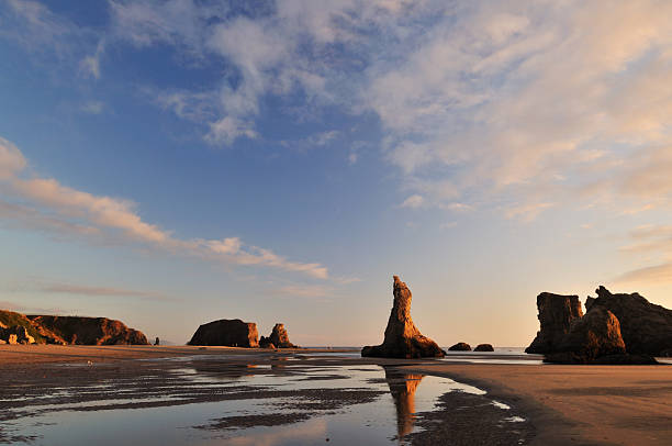 istock sunset with rock formations at bandon beach in Oregon 153532717
