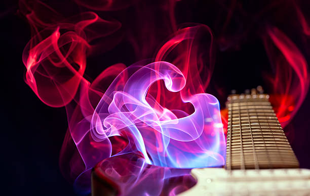 Guitar in smoke stock photo
