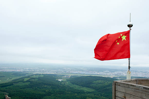 china national flag on the mountain near to North Korea boundary
