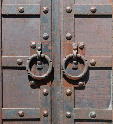 beautiful ancient door lock on ornamented metallic door