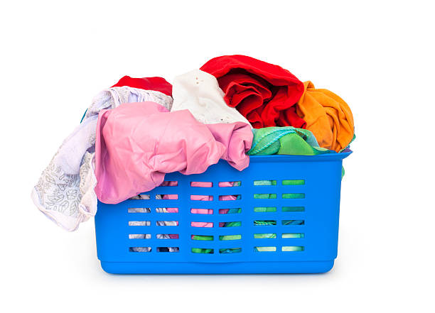 istock laundry basket and dirty clothing 153533290