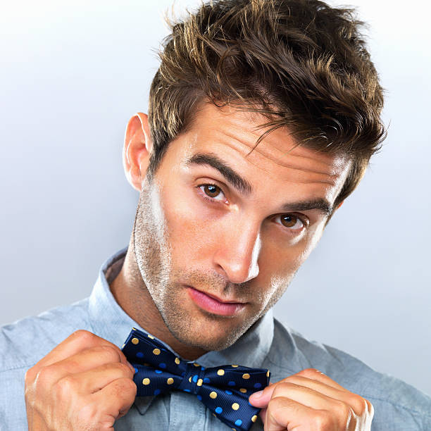 istock Business man fixing his bowtie 153534038