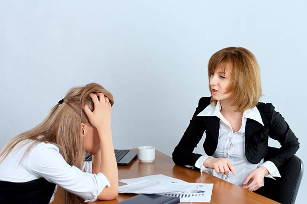 istock Female executive rebukes secretary 153534407