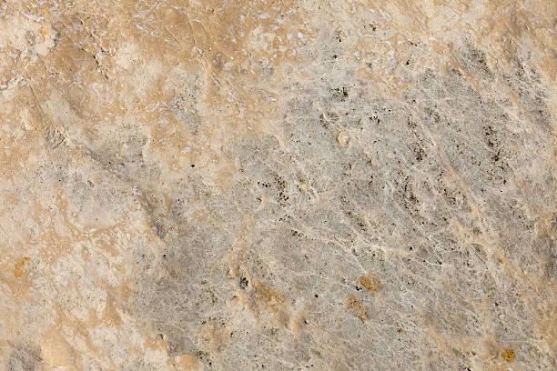 Texture of old yellow stone surface stock photo